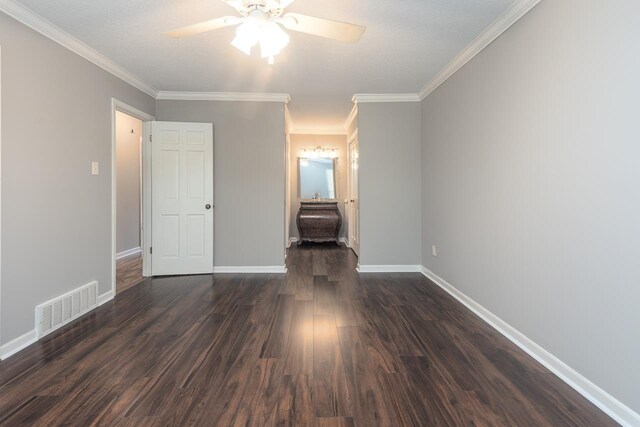 6942 Amberly Rd Unit 6942, Memphis, TN 38119 - unfurnished bedroom featuring dark wood-style flooring, crown molding, and ceiling fan