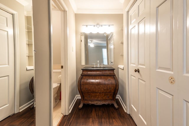 6942 Amberly Rd Unit 6942, Memphis, TN 38119 - half bath with crown molding, wood finished floors, vanity, and a ceiling fan