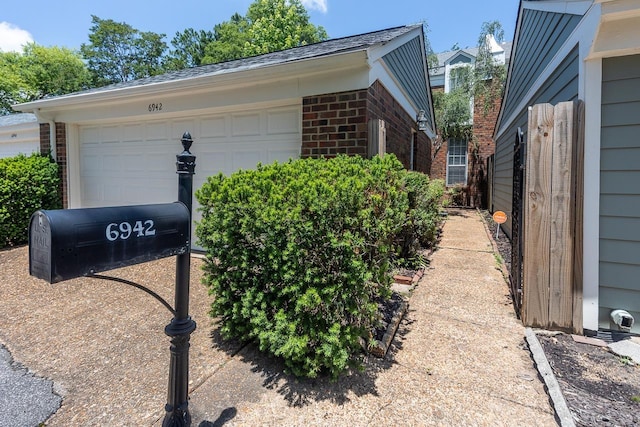 6942 Amberly Rd Unit 6942, Memphis, TN 38119 - view of side of home with brick siding