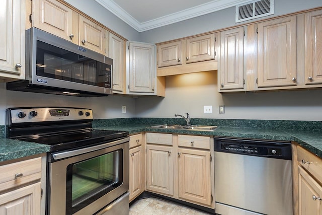6942 Amberly Rd Unit 6942, Memphis, TN 38119 - kitchen with appliances with stainless steel finishes, ornamental molding, and dark countertops
