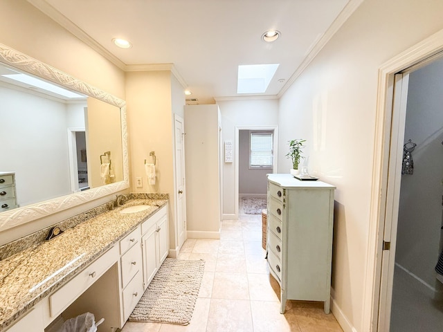 78 Pidgeon Dr, Memphis, TN 38117 - bathroom with a skylight, ornamental molding, vanity, recessed lighting, and tile patterned floors