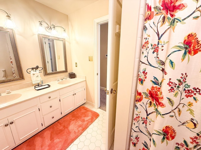 78 Pidgeon Dr, Memphis, TN 38117 - full bath with double vanity, curtained shower, and tile patterned floors
