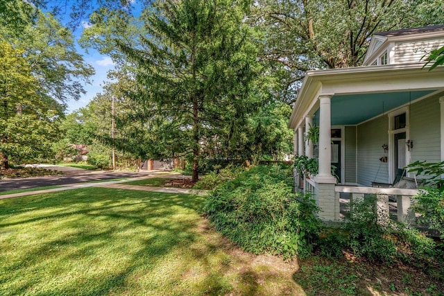 1785 Glenwood Pl, Memphis, TN 38104 - view of grassy yard with a porch