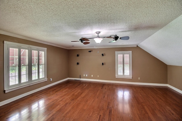 1150 Forest Wood Cv E, Collierville, TN 38017 - additional living space with a textured ceiling, a ceiling fan, wood finished floors, and vaulted ceiling