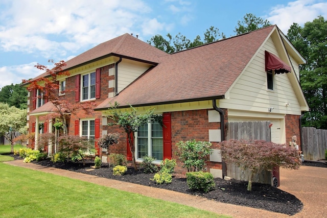 1150 Forest Wood Cv E, Collierville, TN 38017 - view of front of home with brick siding, roof with shingles, and a garage