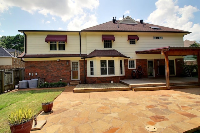 1150 Forest Wood Cv E, Collierville, TN 38017 - back of house featuring a patio, a wooden deck, and brick siding