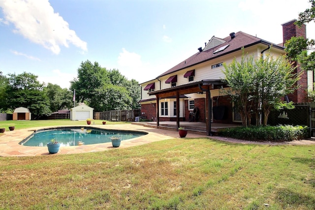 1150 Forest Wood Cv E, Collierville, TN 38017 - view of swimming pool featuring a storage unit