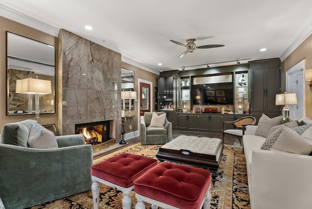 232 Windover Grove Dr, Memphis, TN 38111 - living area featuring crown molding, ceiling fan, a fireplace, and recessed lighting