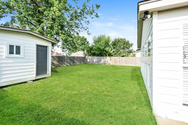 7881 Collins Wood Cv, Memphis, TN 38125 - fenced backyard with an outdoor structure