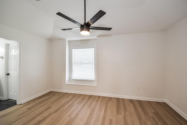 7881 Collins Wood Cv, Memphis, TN 38125 - empty room with wood finished floors and ceiling fan