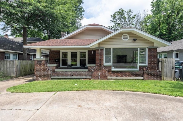 1622 Tutwiler Ave, Memphis, TN 38107 - bungalow with brick siding and roof with shingles