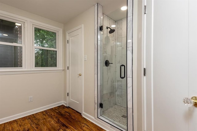 1622 Tutwiler Ave, Memphis, TN 38107 - full bath featuring a stall shower and wood finished floors