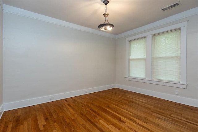 1622 Tutwiler Ave, Memphis, TN 38107 - empty room with wood finished floors and baseboards