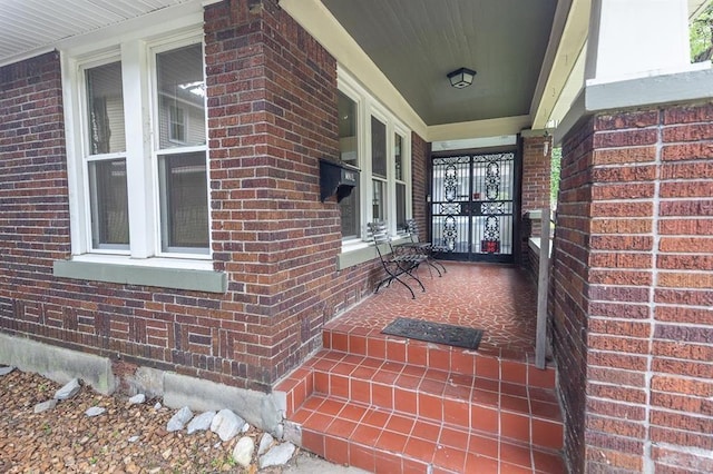 1622 Tutwiler Ave, Memphis, TN 38107 - doorway to property with brick siding and a porch