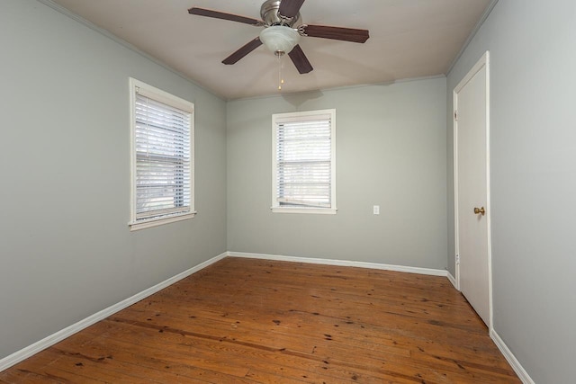 3806 Bluff Rd, Hernando, MS 38632 - spare room with crown molding, hardwood / wood-style flooring, and a ceiling fan