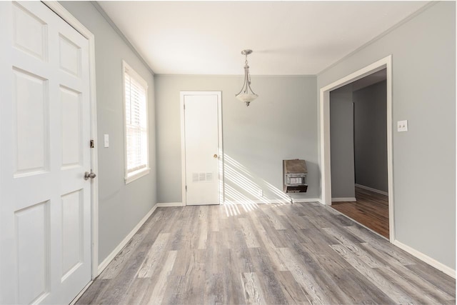 3806 Bluff Rd, Hernando, MS 38632 - unfurnished dining area featuring wood finished floors and heating unit