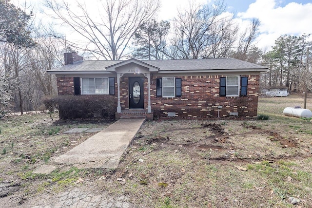 3806 Bluff Rd, Hernando, MS 38632 - ranch-style house with a chimney and brick siding
