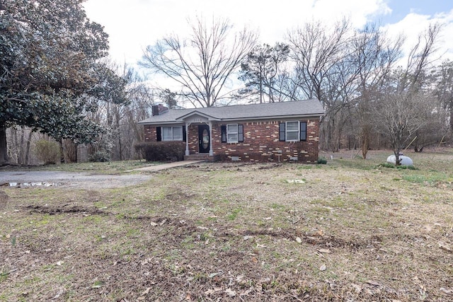 3806 Bluff Rd, Hernando, MS 38632 - ranch-style house featuring a chimney and brick siding