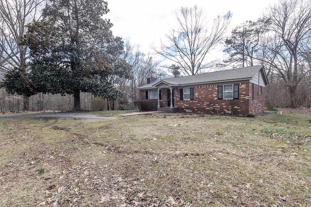 3806 Bluff Rd, Hernando, MS 38632 - single story home with a chimney and brick siding
