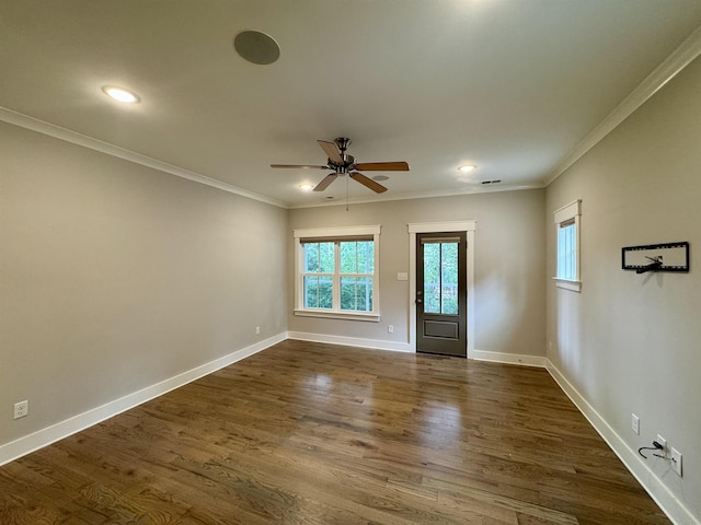 7148 Donnington Dr, Germantown, TN 38138 - empty room featuring ceiling fan, dark wood-style flooring, ornamental molding, and recessed lighting