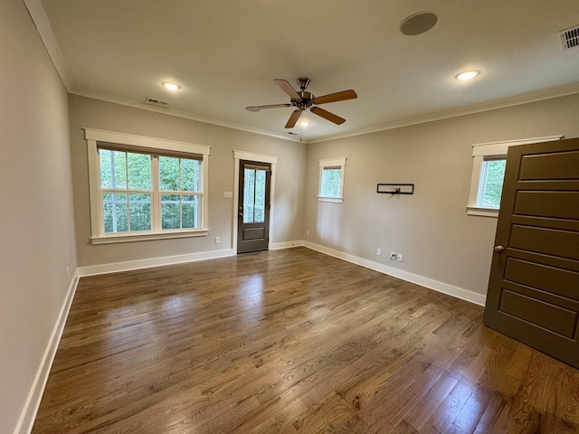 7148 Donnington Dr, Germantown, TN 38138 - empty room with healthy amount of natural light, a ceiling fan, dark wood-type flooring, ornamental molding, and recessed lighting