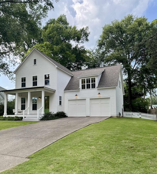 7148 Donnington Dr, Germantown, TN 38138 - view of front of home featuring asphalt driveway, covered porch, roof with shingles, and a garage