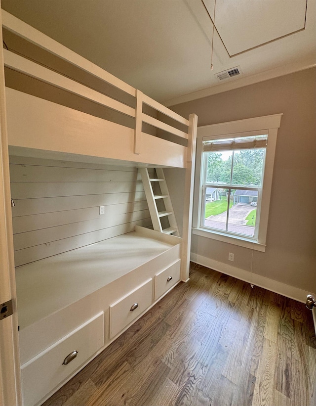 7148 Donnington Dr, Germantown, TN 38138 - unfurnished bedroom featuring attic access and dark wood-style flooring