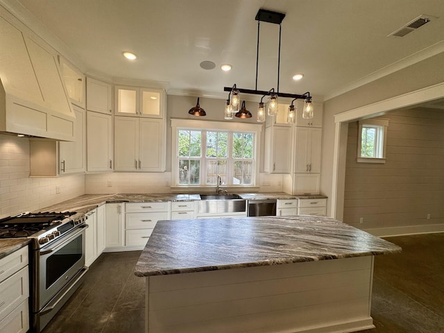 7148 Donnington Dr, Germantown, TN 38138 - kitchen featuring stainless steel appliances, premium range hood, ornamental molding, white cabinets, and decorative backsplash