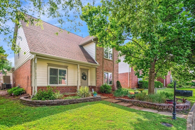 772 Breeze Way, Cordova, TN 38018 - view of front of house with brick siding, a front yard, and a shingled roof