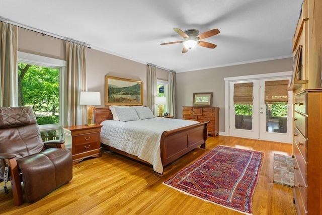 9240 Riveredge Dr, Memphis, TN 38018 - bedroom featuring ornamental molding, light wood-type flooring, access to exterior, and ceiling fan
