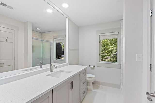 9240 Riveredge Dr, Memphis, TN 38018 - full bathroom featuring vanity, a shower stall, recessed lighting, and tile patterned floors