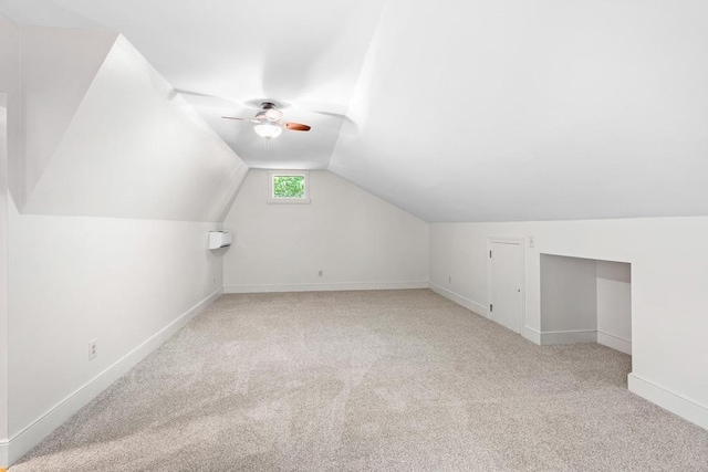 9240 Riveredge Dr, Memphis, TN 38018 - additional living space with carpet floors, ceiling fan, and vaulted ceiling