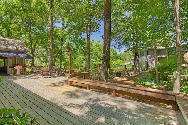9240 Riveredge Dr, Memphis, TN 38018 - wooden deck with a gazebo, area for grilling, and view of wooded area