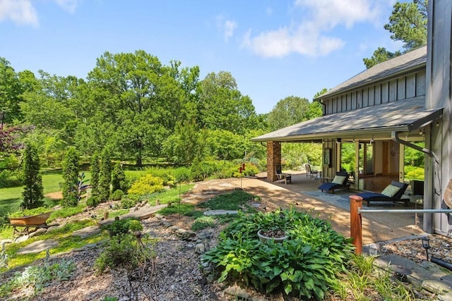 9240 Riveredge Dr, Memphis, TN 38018 - view of yard featuring a patio area