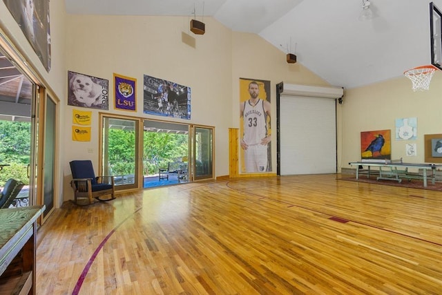 9240 Riveredge Dr, Memphis, TN 38018 - living room featuring wood finished floors and high vaulted ceiling