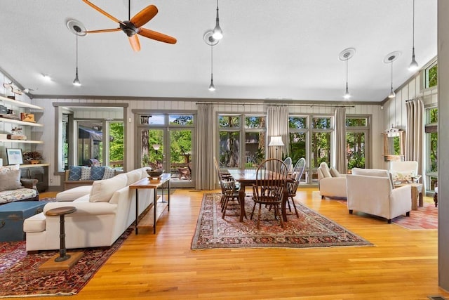 9240 Riveredge Dr, Memphis, TN 38018 - dining area featuring healthy amount of natural light, ceiling fan, light wood finished floors, crown molding, and vaulted ceiling