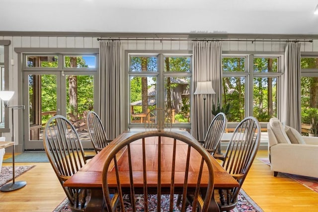 9240 Riveredge Dr, Memphis, TN 38018 - dining space with light wood finished floors and healthy amount of natural light
