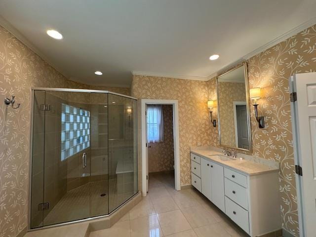 6425 Lebarrett Cv, Memphis, TN 38120 - bathroom featuring ornamental molding, vanity, a shower stall, recessed lighting, and tile patterned flooring