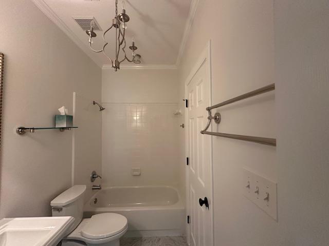 6425 Lebarrett Cv, Memphis, TN 38120 - full bathroom featuring ornamental molding and bathing tub / shower combination