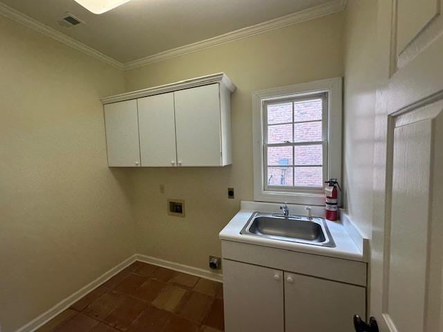 6425 Lebarrett Cv, Memphis, TN 38120 - washroom featuring cabinet space, hookup for an electric dryer, washer hookup, and ornamental molding