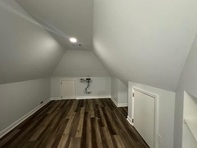 6425 Lebarrett Cv, Memphis, TN 38120 - bonus room featuring vaulted ceiling and dark wood-style floors