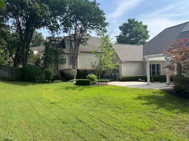 6425 Lebarrett Cv, Memphis, TN 38120 - view of grassy yard with a patio