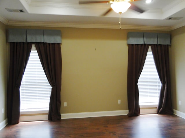 630 Ridgecrest Dr, Pope, MS 38658 - spare room featuring ceiling fan, healthy amount of natural light, dark wood-type flooring, crown molding, and a raised ceiling
