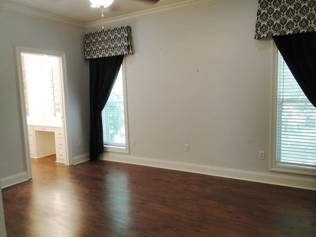 630 Ridgecrest Dr, Pope, MS 38658 - unfurnished room featuring dark wood-style floors, a ceiling fan, and ornamental molding