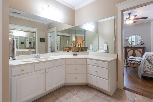 1506 Wolf Bend Rd, Germantown, TN 38138 - ensuite bathroom with crown molding, tile patterned floors, vanity, and a ceiling fan