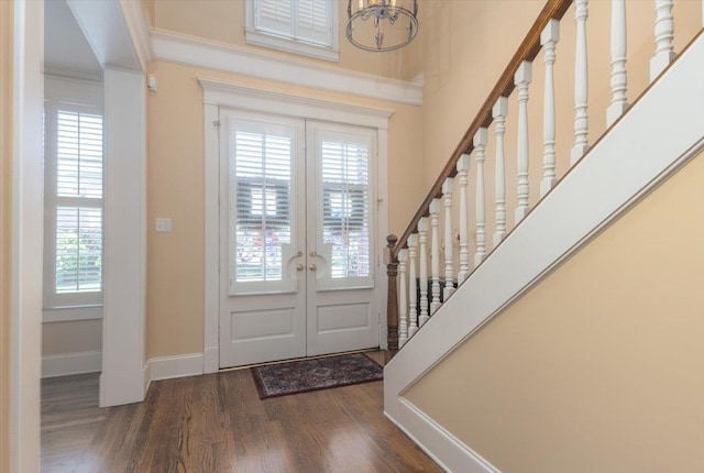 1506 Wolf Bend Rd, Germantown, TN 38138 - entrance foyer featuring wood finished floors, french doors, stairs, and a chandelier