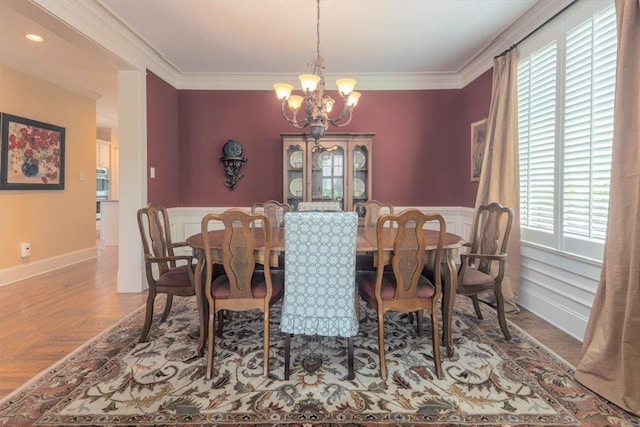 1506 Wolf Bend Rd, Germantown, TN 38138 - dining space featuring a chandelier, crown molding, and wood finished floors