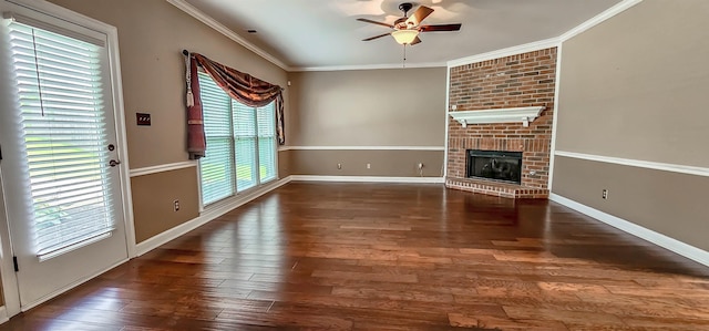 1965 Capas Cv, Cordova, TN 38016 - unfurnished living room featuring a ceiling fan, wood finished floors, ornamental molding, and a brick fireplace