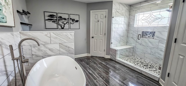 1965 Capas Cv, Cordova, TN 38016 - full bathroom with a stall shower, a freestanding bath, and wood tiled floors
