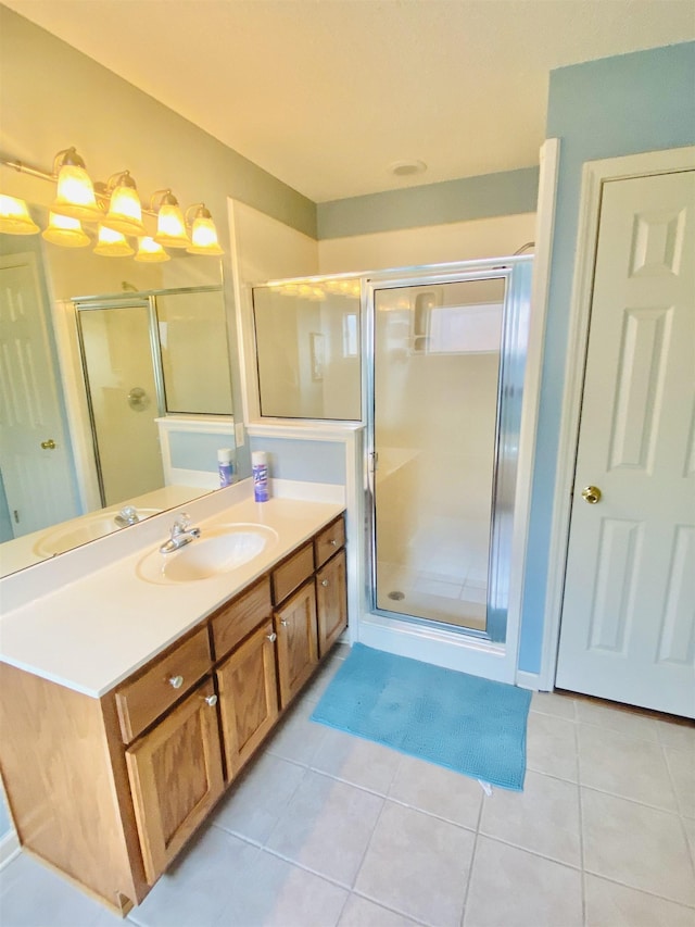1121 W Red Fern Cir W, Cordova, TN 38018 - full bathroom with vanity, tile patterned flooring, and a stall shower